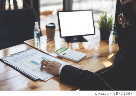Administrator accountant making report calculating balance. Audit and Anti Bribery concept. 98721937