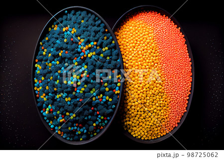 Crushed plastic granules for recycling. Plastic crusher. Recycled plastic with mixed colors. The concept of recycled plastic used Crushed plastic granules for recycling. Plastic crusher. Recycled plastic with mixed colors. The concept of recycled plastic used 98725062