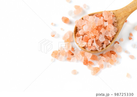 Top view of Himalayan Rock pink Salt on wood spoon isolated Top view of Himalayan Rock pink Salt on wood spoon isolated 98725330