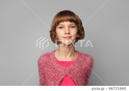 Pretty child kid girl 7 years old wearing pink clothes 98725989