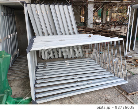 KUALA LUMPUR, MALAYSIA -MARCH 5, 2020: Mild Steel Door Frame at the construction site. Install by construction workers. More quality and durable compare to the wooden door frame. KUALA LUMPUR, MALAYSIA -MARCH 5, 2020: Mild Steel Door Frame at the construction site. Install by construction workers. More quality and durable compare to the wooden door frame. 98726038