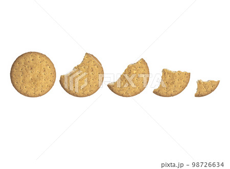 Steps of simple cookie different staged being devoured. Isolated on white background. top view, eating a freshly baked tasty cookie 98726634