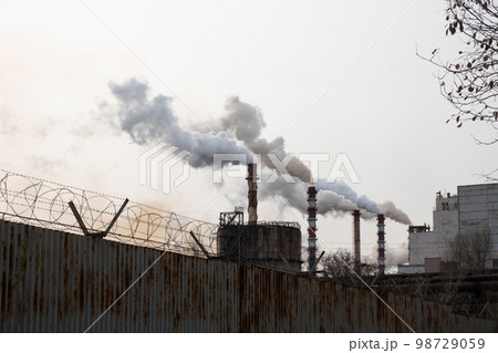 Smoke from the chimneys at the factory. Environmental pollution. Smoke from the chimneys at the factory. Environmental pollution. 98729059