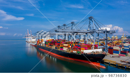 Aerial view container cargo ship in import export global business commercial trade logistic transportation of international by container cargo ship, Container cargo freight shipping at industrial port Aerial view container cargo ship in import export global business commercial trade logistic transportation of international by container cargo ship, Container cargo freight shipping at industrial port 98736830