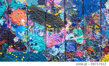 Abstract colorful wood texture, Stained wood wall background disorganized colorful background, Background for party abstract colorful background. 98737022