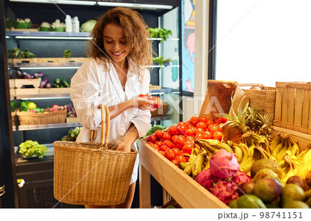 Organic Food. Woman Holding Basket And Choosing Fresh Vegetables 98741151