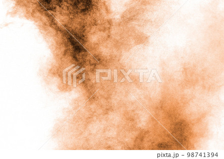 Freeze motion of brown dust explosion.Stopping the movement of brown powder. 98741394