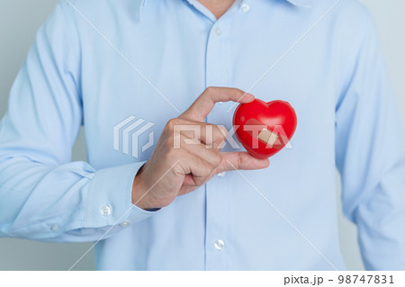 man hand holding red heart shape. love, donor, world heart day, world health day and Insurance concepts 98747831