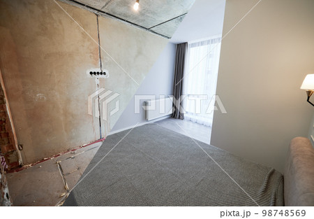 Comparison of bedroom with large panoramic window before and after renovation. Photo collage of old apartment before restoration and new renovated flat with bed and elegant interior design. 98748569