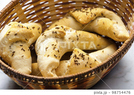 homemade rolls with salt and cumin homemade rolls with salt and cumin 98754476