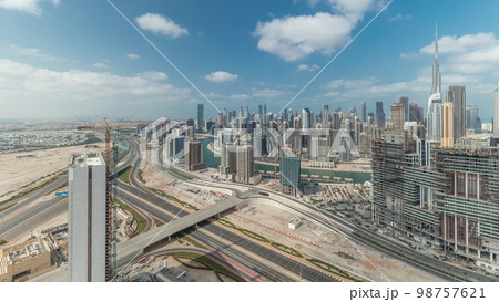 Panorama showing skyline of Dubai with business bay and downtown district . Panorama showing skyline of Dubai with business bay and downtown district . 98757621
