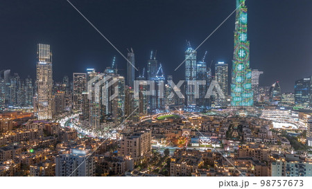 Dubai Downtown night with tallest skyscraper and other towers 98757673