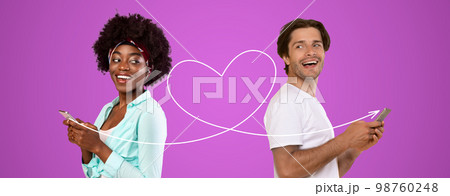 Perfect Match. Interracial Couple Using Dating App On Smartphone Together 98760248