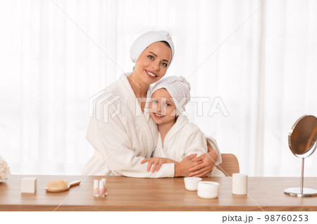 Beauty Portrait Of Happy Young Mom And Daughter In Bathrobes And Towels 98760253