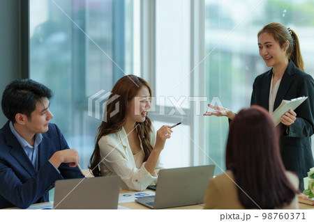 Group of Business people and Accountant checking data document on digital tablet for investigation of corruption account. Anti Bribery concept. Group of Business people and Accountant checking data document on digital tablet for investigation of corruption account. Anti Bribery concept. 98760371