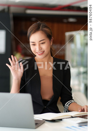 Beautiful asian woman using video call application. blogger, video conference, comfortable usage concept. Beautiful asian woman using video call application. blogger, video conference, comfortable usage concept. 98760494