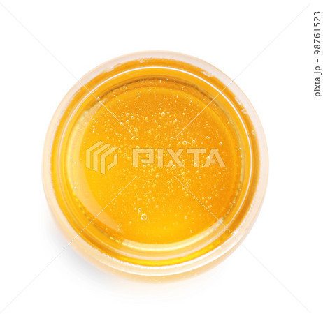 Jar of organic honey isolated on white, top view 98761523
