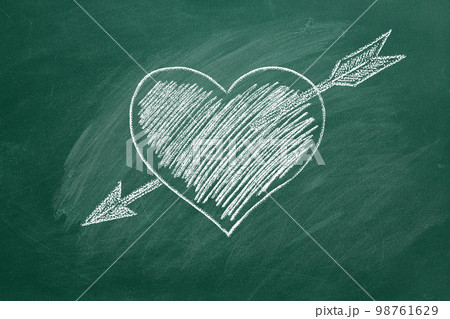 Cupid's arrow hit the heart 98761629