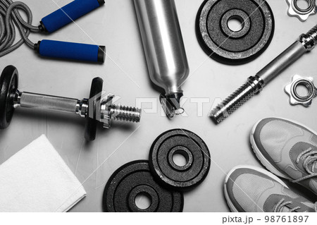 Gym equipment on light grey background, flat lay 98761897