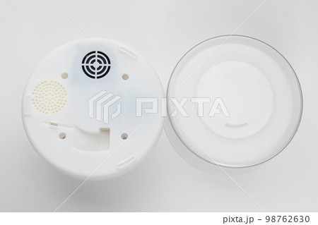 white small humidifier on a white background. white small humidifier on a white background. 98762630
