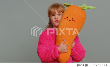 Bully child girl kid showing making faces at camera, fooling around, aping with silly face, teasing Bully child girl kid showing making faces at camera, fooling around, aping with silly face, teasing 98762851