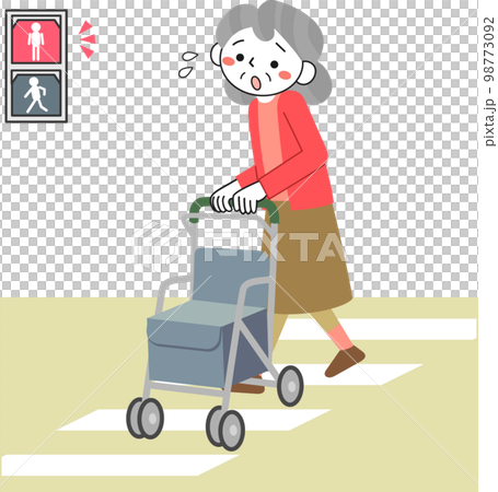 道路を渡り切れず信号が赤になって困っているシニア女性 98773092