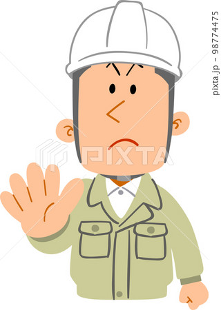 拒否の仕草を示す、作業着を着てヘルメットを被った若い男性の上半身 98774475