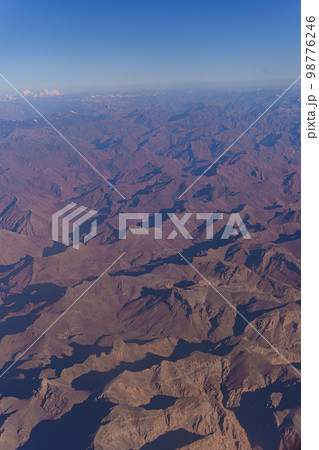 View from the plane to the surface of the earth with a mountain landscape of the Himalayas at Ladakh, India 98776246