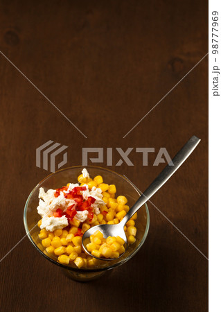 Esquites with corn, cheese, mayonnaise and chili. Mexican street food. Top view 98777969