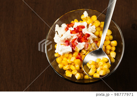 Esquites or Trolley with corn, cheese, mayonnaise and chili. Mexican street food. Top view 98777971