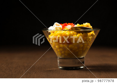 Esquites or Trolley with corn and chili. Mexican street food 98777978