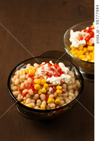 Esquites with corn and white kidney beans, cheese and chili. Mexican street food 98777984