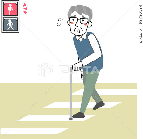 道路を渡り切れず信号が赤になって困っているシニア男性 98780134