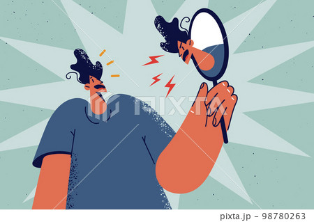 Confused man see angry reflection in mirror  98780263