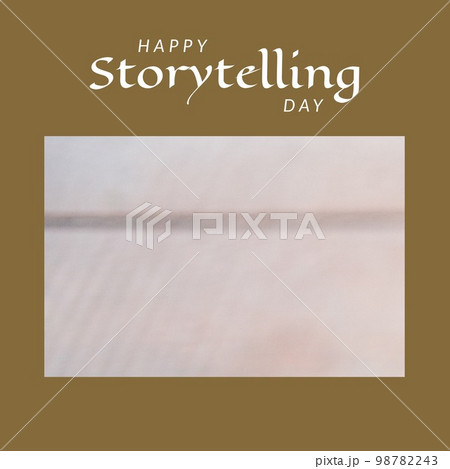 Composition of happy storytelling day text over blurred background with copy space 98782243