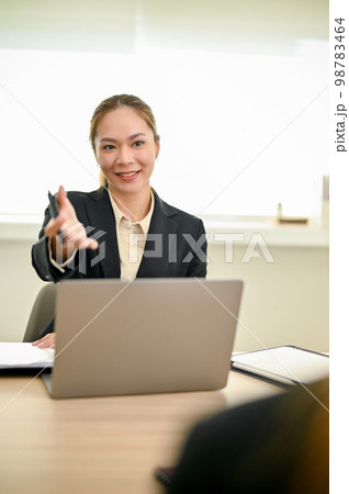 Professional Asian female HR recruiter or interviewer interviewing a candidate 98783464