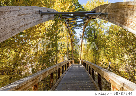 USA, Idaho, Hailey, View across wooden Bow Bridge 98787244
