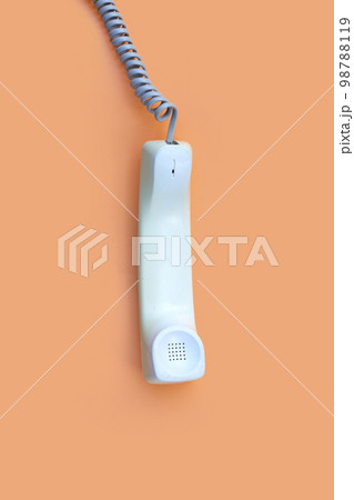 Handset of landline phone. Copy space 98788119