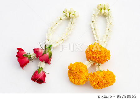 Jasmine and crown flower garland with rose and marigold flower on white background 98788965
