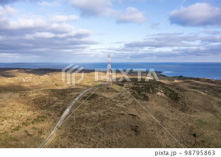 Drone aerial photograph of a communications tower on King Island 98795863