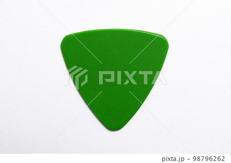 Guitar pick isolated on white background. Triangular guitar pick Guitar pick isolated on white background. Triangular guitar pick 98796262
