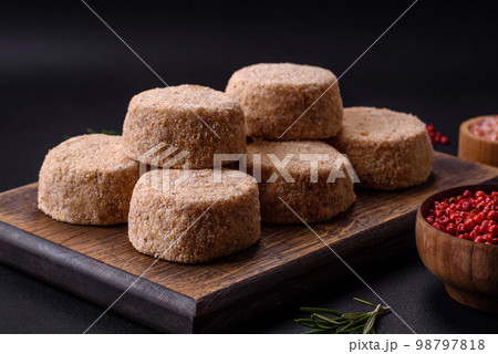 Raw falafel, a traditional oriental dish with spices and herbs Raw falafel, a traditional oriental dish with spices and herbs 98797818