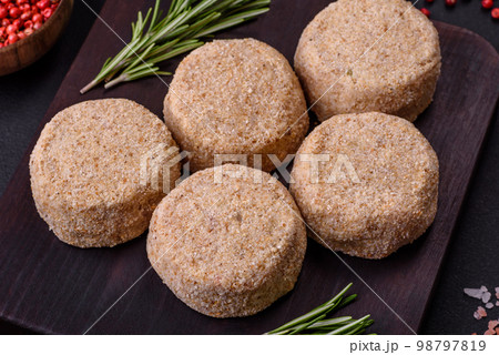 Raw falafel, a traditional oriental dish with spices and herbs Raw falafel, a traditional oriental dish with spices and herbs 98797819