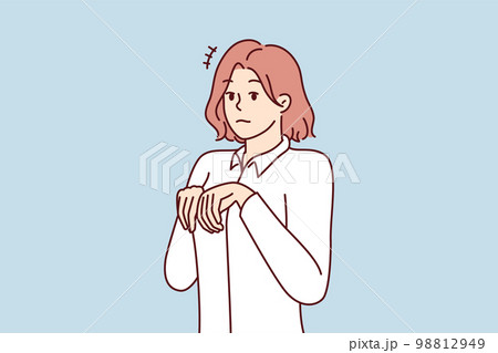 Girl stands like puppy or bunny, bending palms near chest in pose symbolizing humility Girl stands like puppy or bunny, bending palms near chest in pose symbolizing humility 98812949