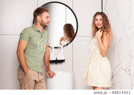 Happyl adult man and woman in casual clothes 98814931