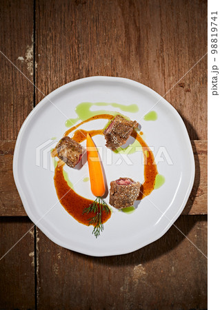 Beautiful and tasty food on a plate 98819741