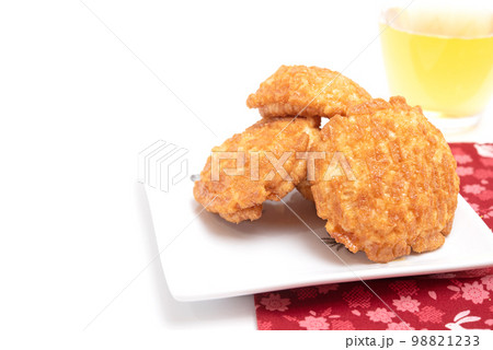 Japanese snack food. Fried crispy rice crackers isolated on white background Japanese snack food. Fried crispy rice crackers isolated on white background 98821233