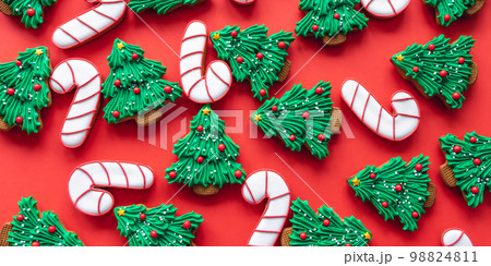 Christmas colored handmade gingerbread cookies, flat lay. Christmas colored handmade gingerbread cookies, flat lay. 98824811