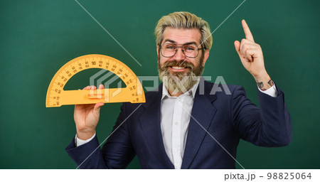 my best idea. back to school. college education concept. mathematics favorite subject. study geometry lesson. measurement concept. bearded man in suit. math teacher use protractor tool my best idea. back to school. college education concept. mathematics favorite subject. study geometry lesson. measurement concept. bearded man in suit. math teacher use protractor tool 98825064