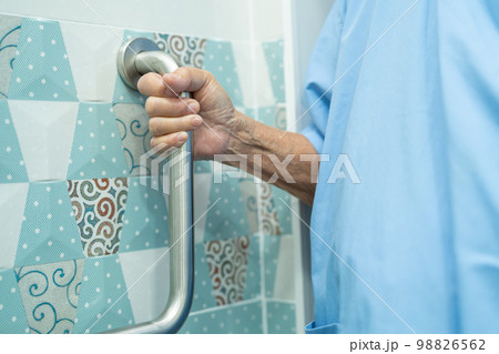 Asian senior or elderly old lady woman patient use toilet bathroom handle security in nursing hospital ward, healthy strong medical concept. 98826562
